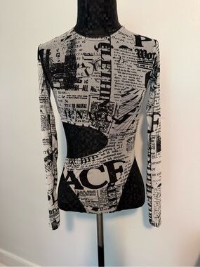 Pretty Little Thing long-sleeve newspaper print bodysuit